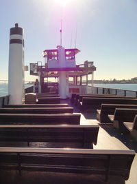 Built structure by sea against sky