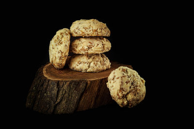 Close-up of cookies against black background