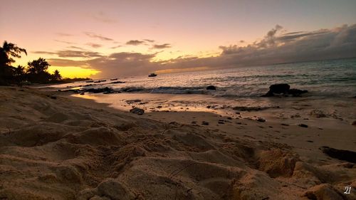 Scenic view of sea against sky during sunset