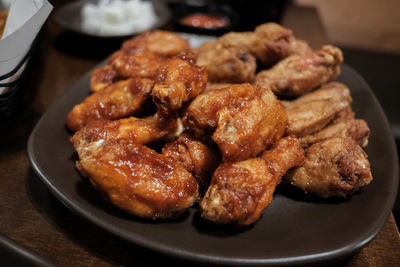 High angle view of meat in plate on table