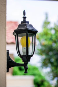 Close-up of street light against sky
