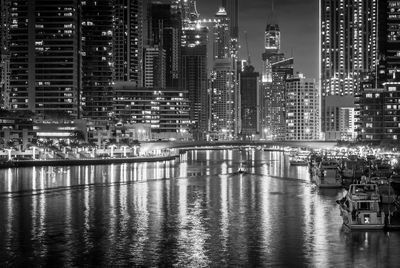 Buildings in city at dusk