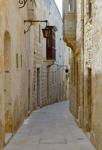 Narrow street between buildings