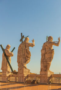 Low angle view of statue against sky