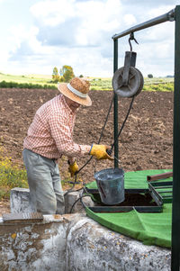 Man working on field