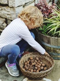 Midsection of woman in basket