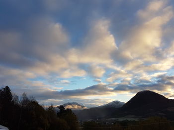 Scenic view of mountains against sky during sunset