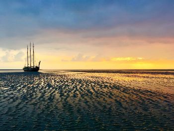 Scenic shot of calm sea at sunset