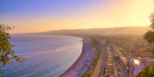 High angle view of beach against sky during sunset