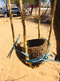 Close-up of fishing net on beach