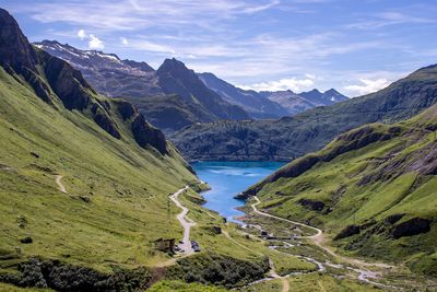 High angle view of country road amidst mountains