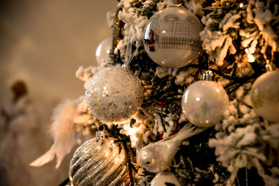 Close-up of christmas decoration hanging on tree