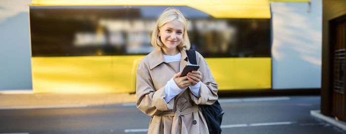 Young woman using mobile phone