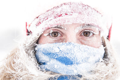 Portrait of woman covered with snow