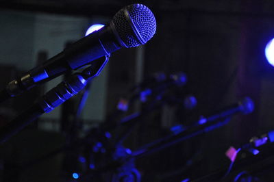 Close-up of microphone in nightclub