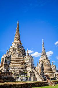 View of temple building against blue sky