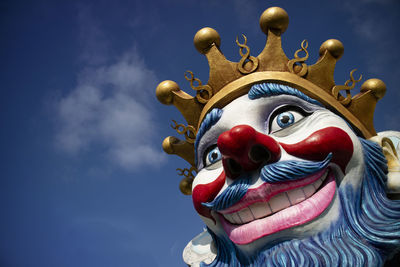 Low angle view of statue against sky