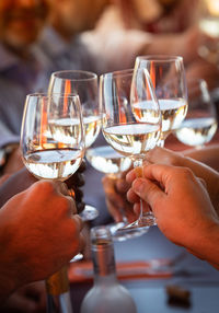 People toasting glasses of champagne in party