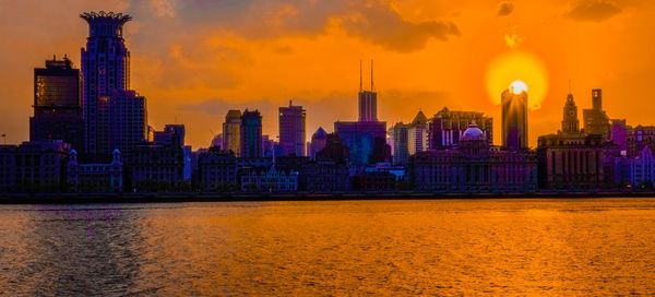 View of cityscape at sunset