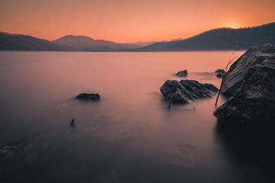 Scenic view of sea against sky during sunset