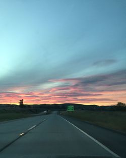 Empty road at sunset