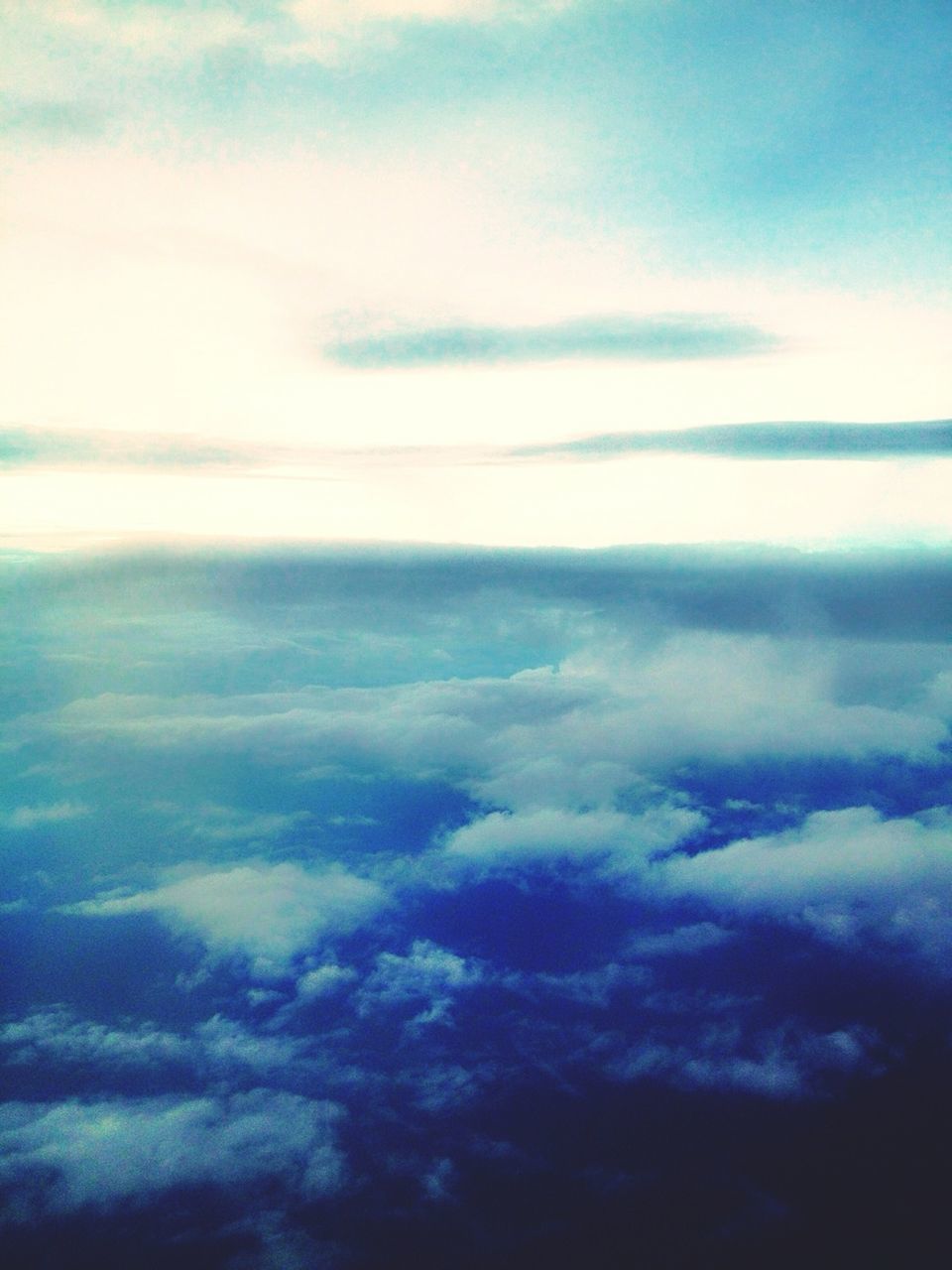 sky, tranquil scene, scenics, tranquility, beauty in nature, cloud - sky, nature, idyllic, sea, cloud, blue, cloudy, water, cloudscape, outdoors, horizon over water, no people, majestic, day, dusk