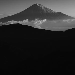 Scenic view of silhouette mountains against sky