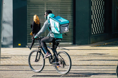 People riding bicycle