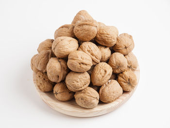 Close-up of blueberries against white background