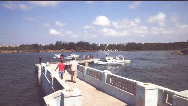 water, sky, nautical vessel, pier, transportation, railing, cloud - sky, boat, sea, nature, cloud, mode of transport, tranquil scene, tranquility, day, lake, men, river, scenics