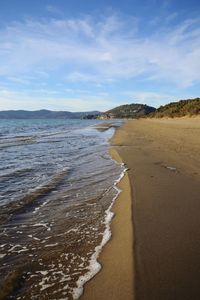 Scenic view of beach against sky