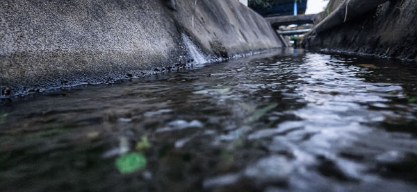 Surface level of water flowing over river