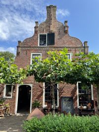 Low angle view of old building against sky