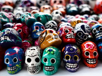Close-up of colorful skull figurines for sale