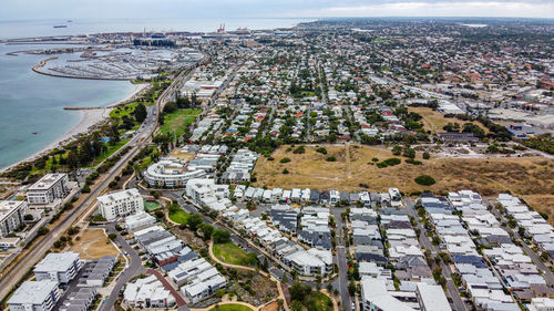 High angle view of street amidst buildings in city