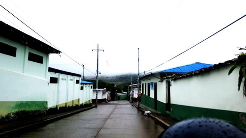 Narrow road along buildings