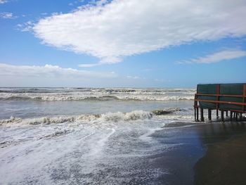 Scenic view of beach against sky