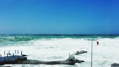 Scenic view of sea against clear sky