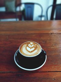 Coffee cup on table