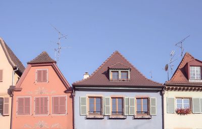 Houses against clear sky