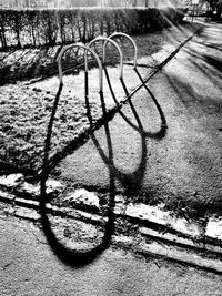 Shadow of bicycle on snow