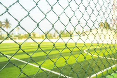 Full frame shot of chainlink fence at playing field