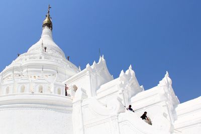 Low angle view of white building against sky