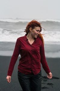 Positive lady on reynisfjara beach scenic photography