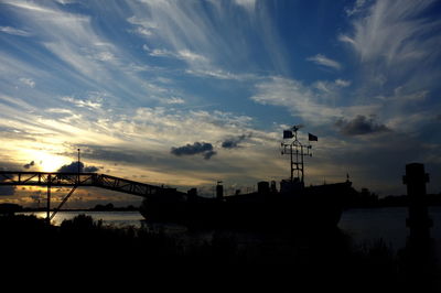 Built structure against sky at sunset