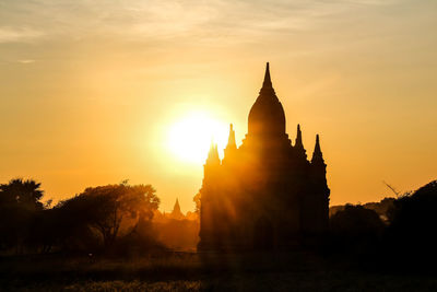 Silhouette of temple during sunset