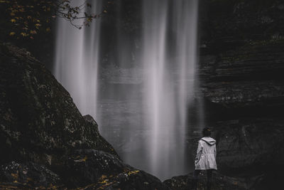 Scenic view of waterfall in forest