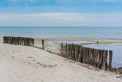 Scenic view of beach against sky