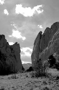 Rocky cliff against sky