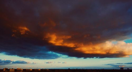 Scenic view of cloudy sky at sunset